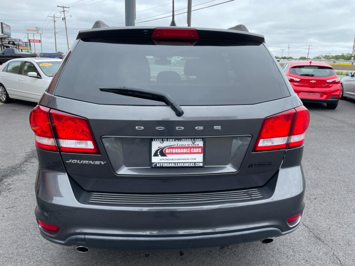 2019 Silver Dodge Journey (3C4PDCBG4KT) with an V6, 3.6 Liter engine, Automatic, 4-Spd w/AutoStick transmission, located at 8008 Warden Rd, Sherwood, AR, 72120, (501) 801-6100, 34.830078, -92.186684 - Photo#6